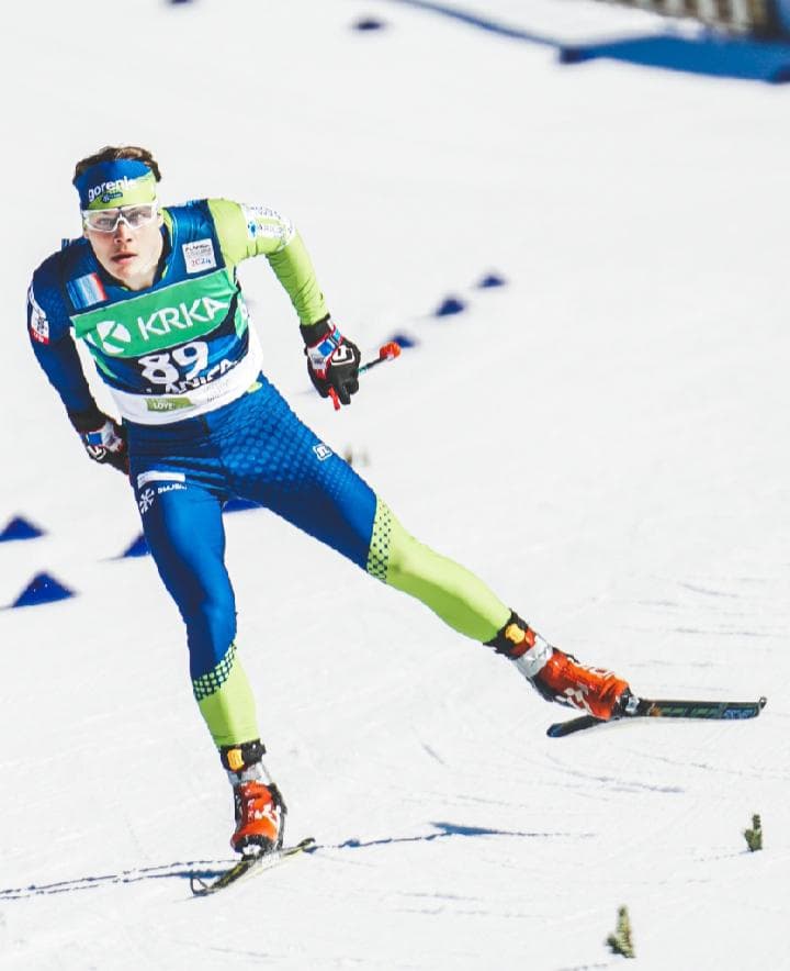 Jaka Marinko skating in a cross-country ski race